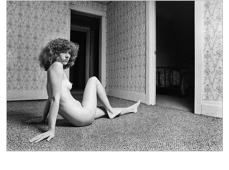 nude in an empty hotel